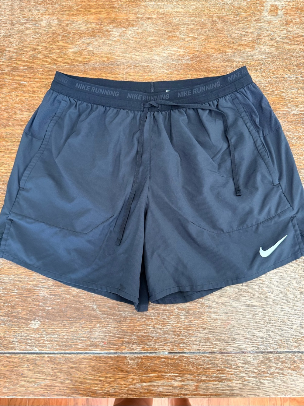 Nike Women’s Black Athletic Running Shorts with White Swoosh